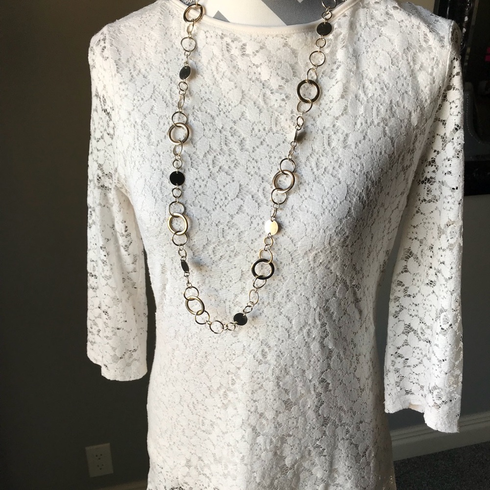 Lace 3/4 sleeve top with built in liner.